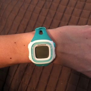 Teal Garmin Forerunner 15 with heart rate monitor